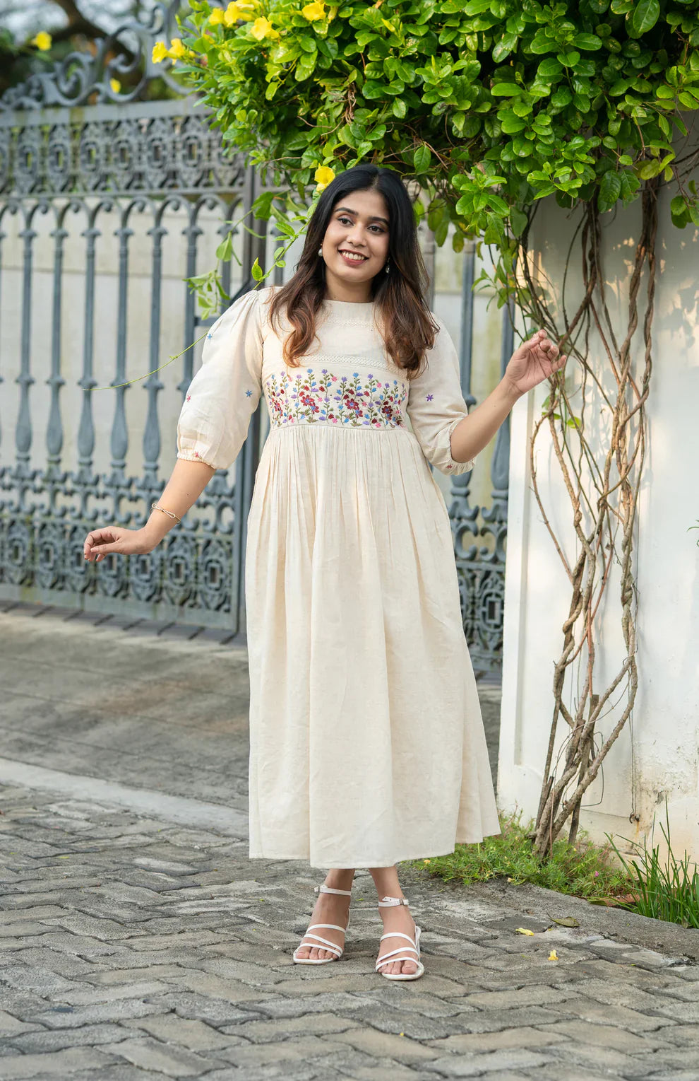 Off-white flex cotton dress with floral embroidery and crochet lace detailing on yoke and sleeves