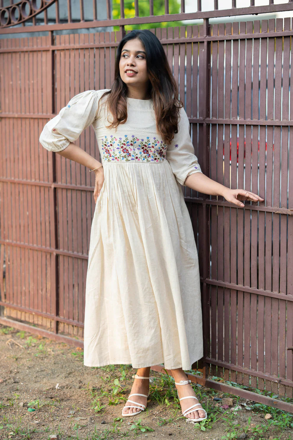 Off-white flex cotton dress with floral embroidery and crochet lace detailing on yoke and sleeves